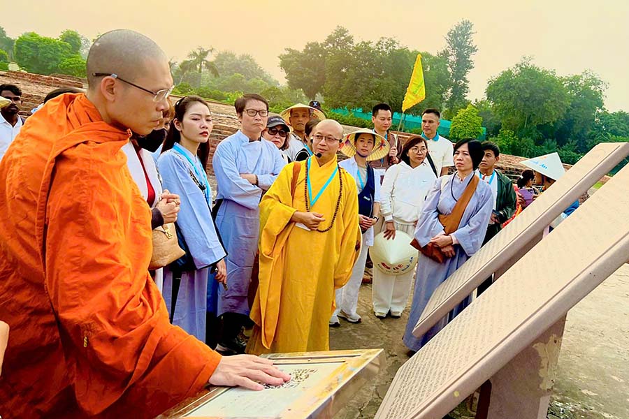 Monk speaking during a pilgrimage